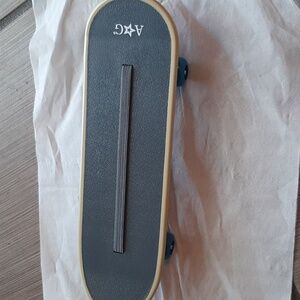 American Girl Skateboard with Blue Wheels